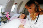 Air Ambulance Nurse with child patient
